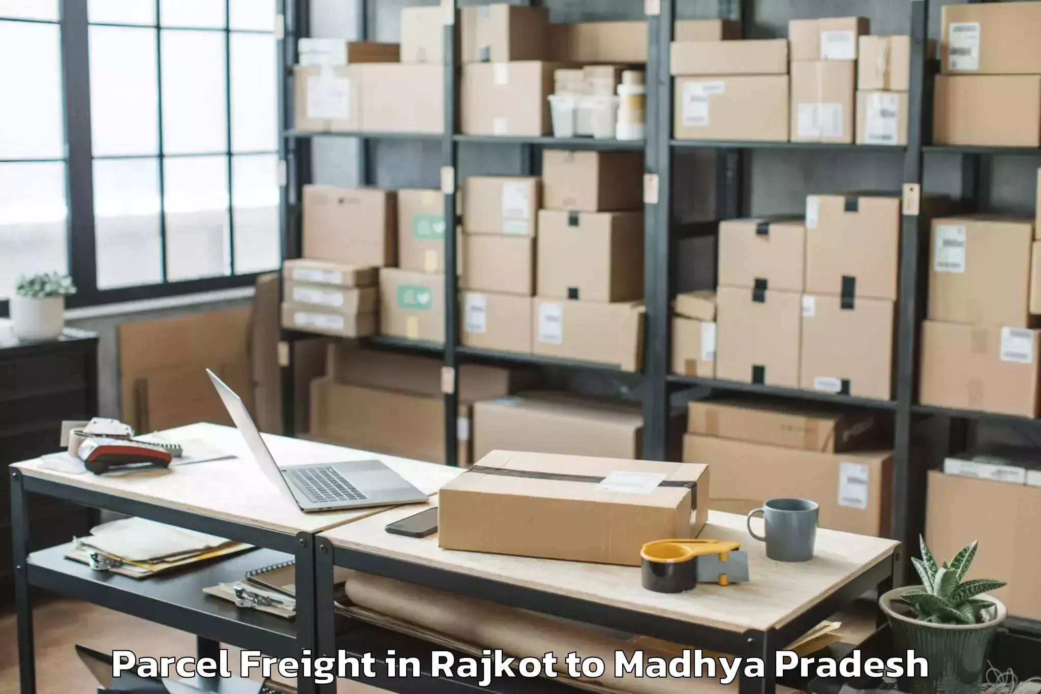 Book Rajkot to Garh Rewa Parcel Freight Online